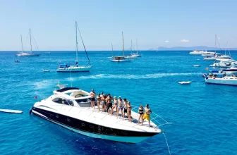 A clean, fully prepared yacht salon and deck ready to welcome guests for a charter, representing host excellence