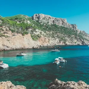 Crystal clear azure water in a protected rocky cove (cala) in Mallorca, a highlights of a Mallorca yacht charter