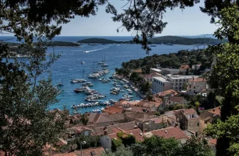 Panoramic view of Hvar town harbour and yachts at anchor from Fortica Castle, a highlight of a Croatia yacht charter