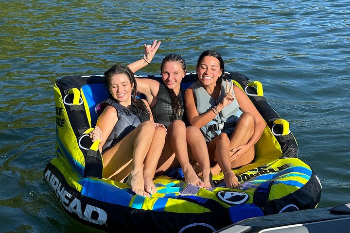 Towable tubing is always a good time - Wakesurf Boat on Lake Austin - BYOB Captained (up to 12 guests)