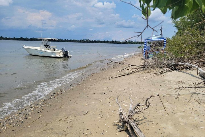 Anchored at sharktooth beach. - 3 hour Private Afternoon Boat Ride and Beach Excursion