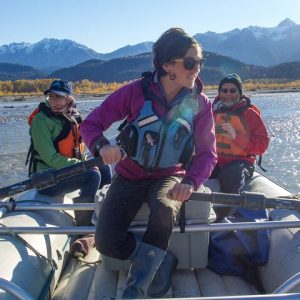 River guide Lizi navigating the braided channels of a glacial river in the Chilkat Bald Eagle Preserve - Private Group Eagle Preserve Float Trip in Haines