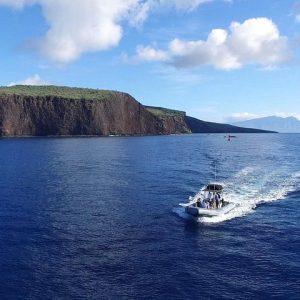 Cruising along Lanai's coast in our small group adventure vessels! - Lanai Eco-Raft Snorkel & Dolphin Watch Small Group Tour from Maui