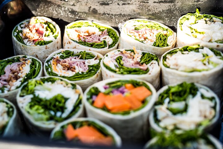Optional (call to add) Fresh deli lunch includes assorted wraps - Chicken Caesar, Ham BLT, or Falafel/Veggie (GF wrap available upon request). - Lanai Eco-Raft Snorkel & Dolphin Watch Small Group Tour from Maui