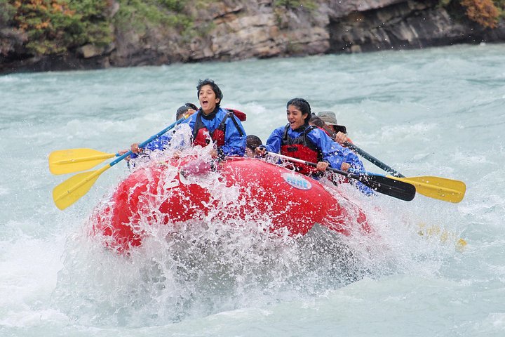 Plunging through numerous rapids - Athabasca Canyon Run Family Rafting: Class II Plus Rapids