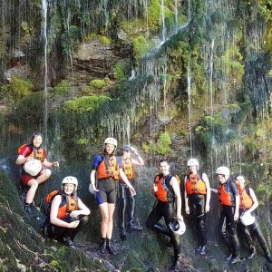 Shower under a spring fed waterfall - Rangitaiki River White Water Scenic Rafting from Rotorua