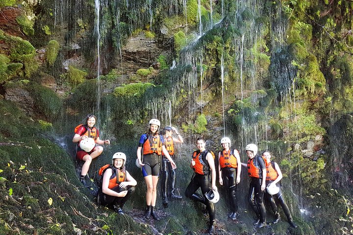 Shower under a spring fed waterfall - Rangitaiki River White Water Scenic Rafting from Rotorua