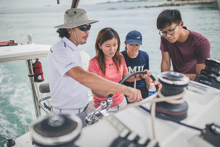 Learn a tip or two about sailing - Singapore Sunset and Morning Cruise On A Luxury Catamaran