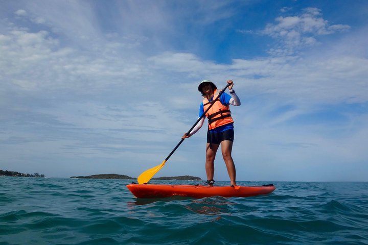 Try out the standup paddle board! - Singapore Sunset and Morning Cruise On A Luxury Catamaran