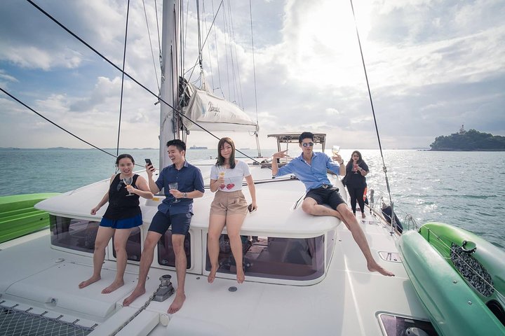 It's fun with a group of friends - Singapore Sunset and Morning Cruise On A Luxury Catamaran