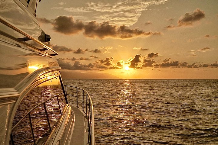 Cruising the bay at sunset aboard our beautifully maintained yacht. - Puerto Vallarta: Luxury Yacht Sunset Cruise with Premium Open Bar